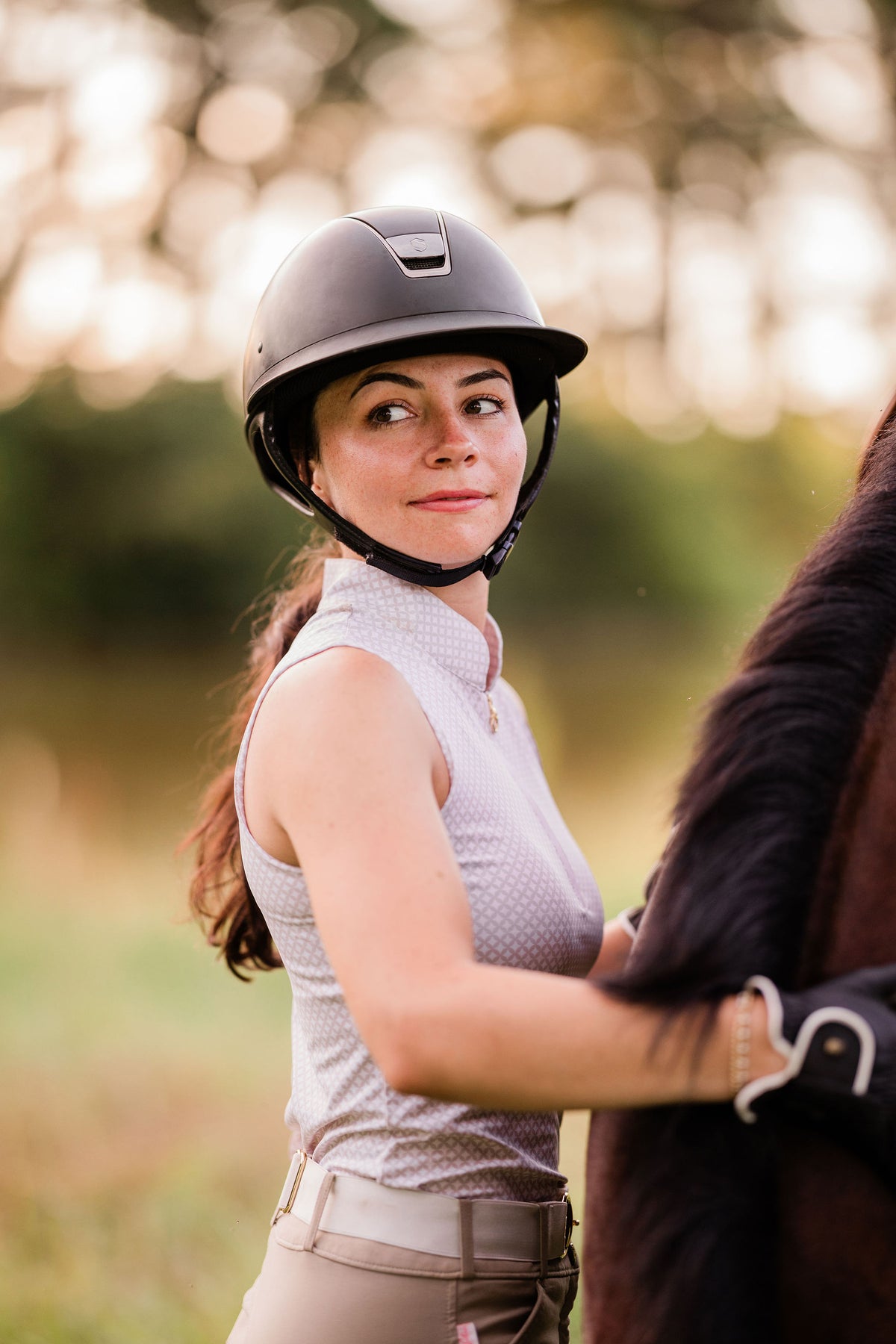 White Sleeveless Riding Top
